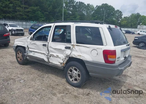 1999 Jeep Grand Cherokee Laredo from USA, damaged, VIN 1J4GW58S3XC505985